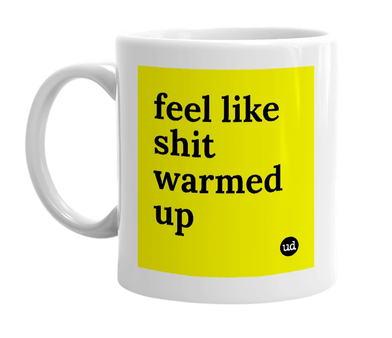 White mug with 'feel like shit warmed up' in bold black letters