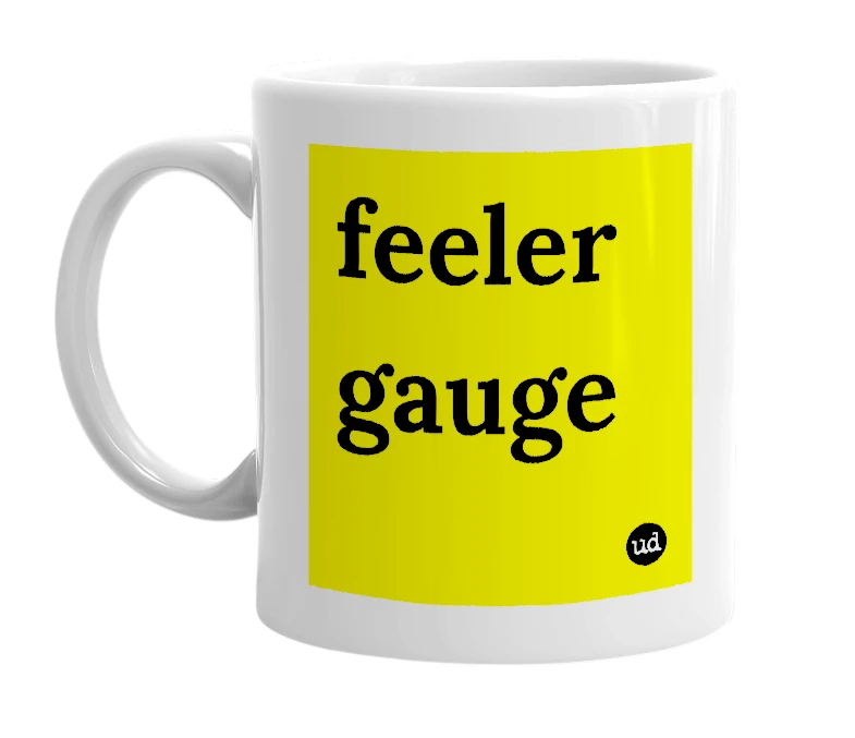White mug with 'feeler gauge' in bold black letters