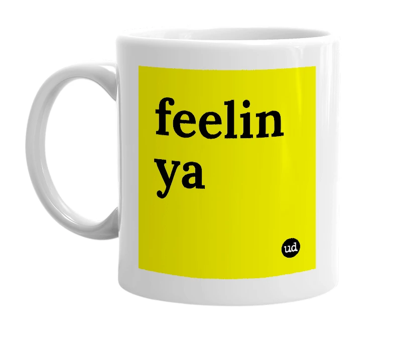 White mug with 'feelin ya' in bold black letters