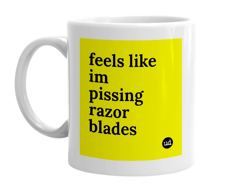 White mug with 'feels like im pissing razor blades' in bold black letters