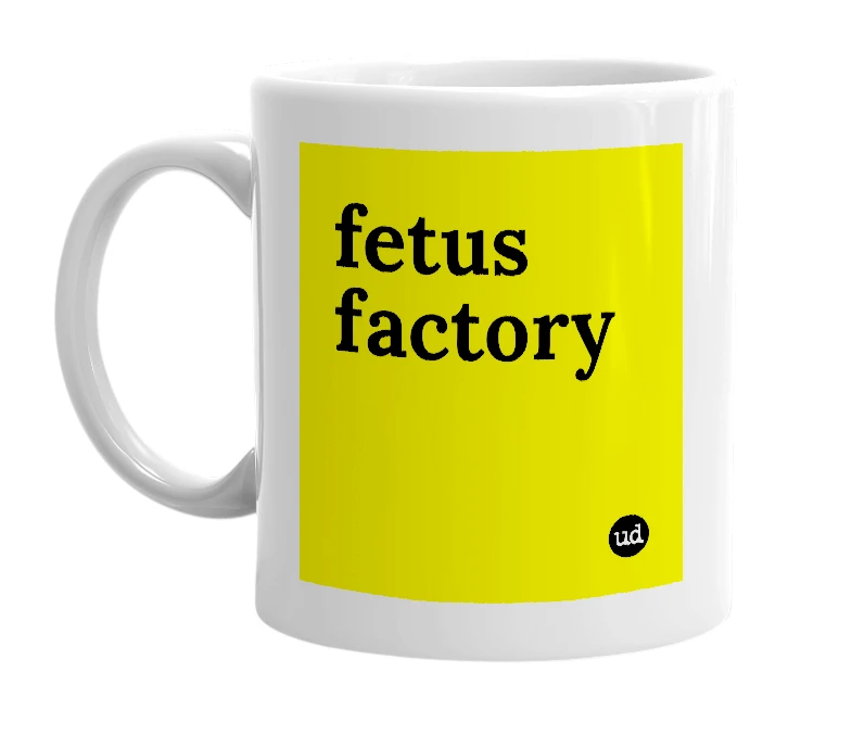 White mug with 'fetus factory' in bold black letters