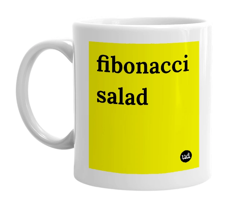 White mug with 'fibonacci salad' in bold black letters