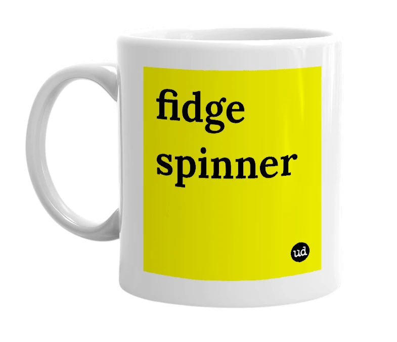White mug with 'fidge spinner' in bold black letters