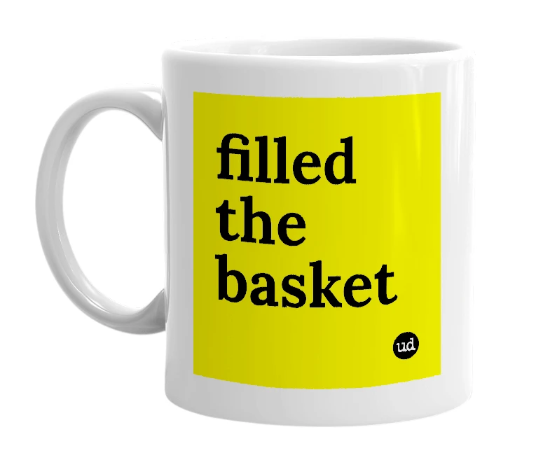 White mug with 'filled the basket' in bold black letters