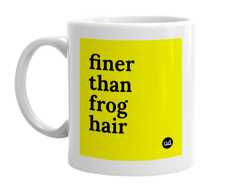 White mug with 'finer than frog hair' in bold black letters