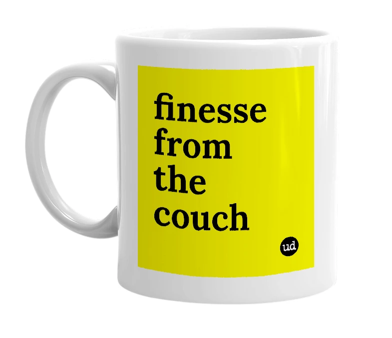 White mug with 'finesse from the couch' in bold black letters