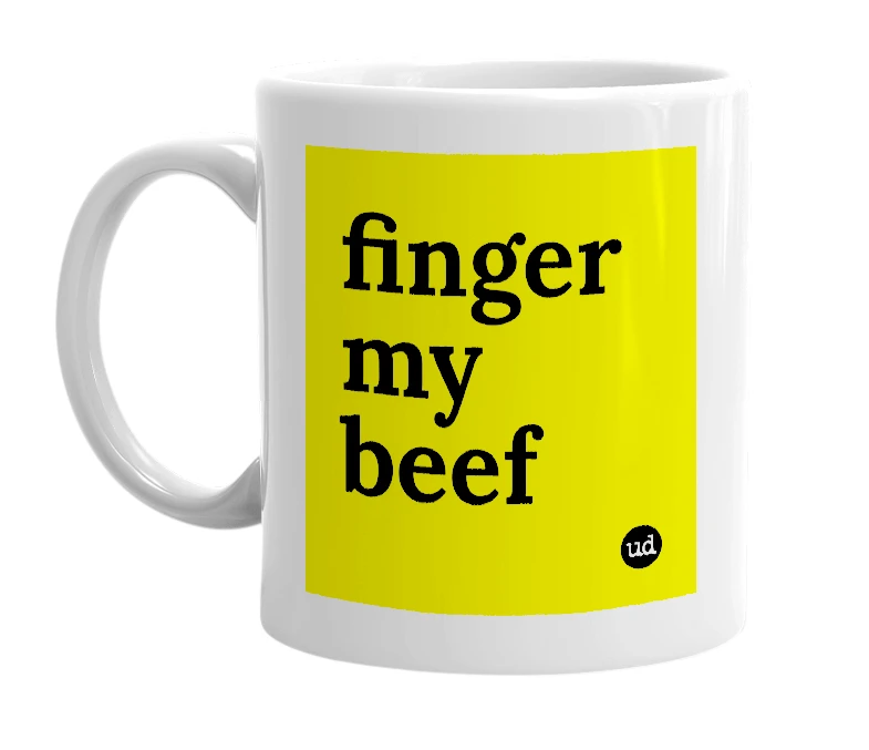 White mug with 'finger my beef' in bold black letters