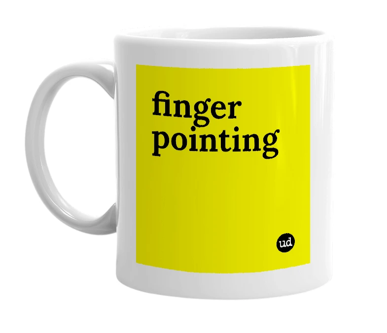 White mug with 'finger pointing' in bold black letters