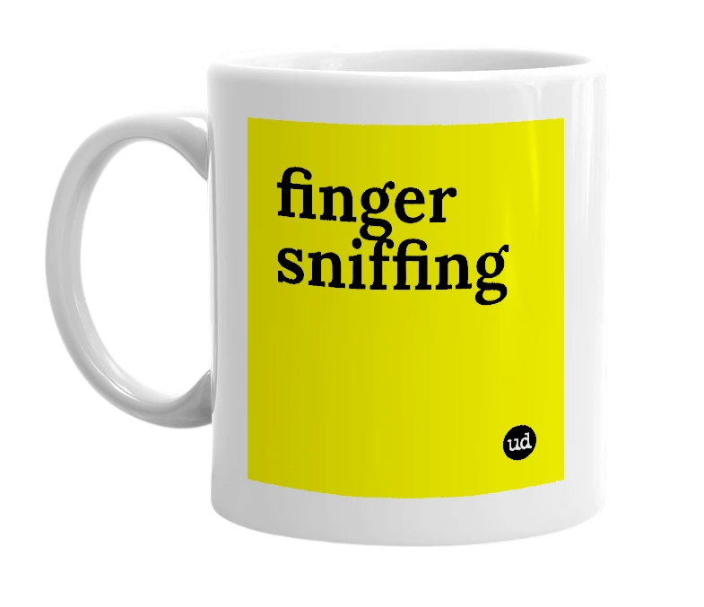 White mug with 'finger sniffing' in bold black letters