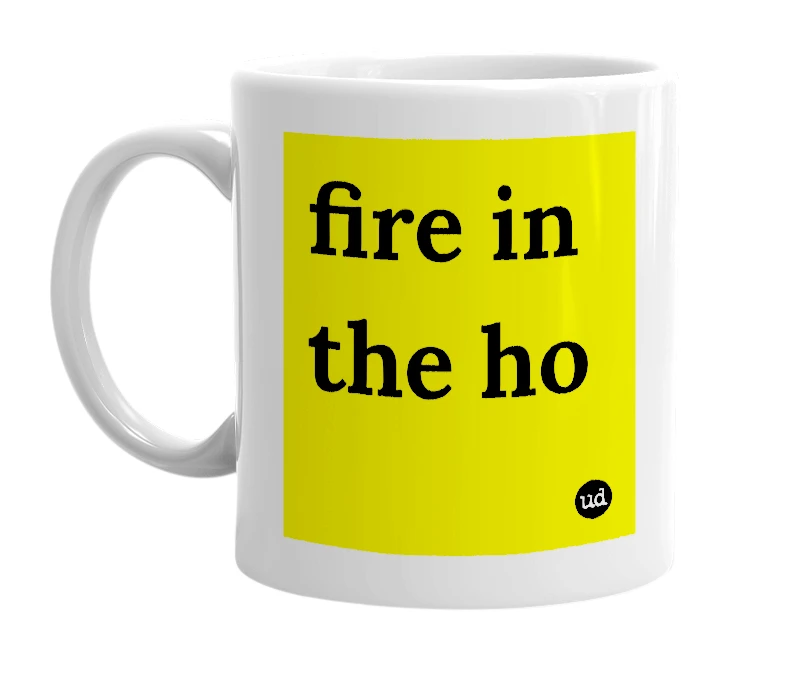 White mug with 'fire in the ho' in bold black letters