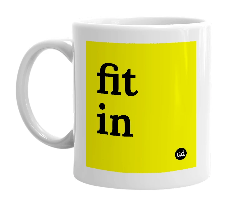 White mug with 'fit in' in bold black letters
