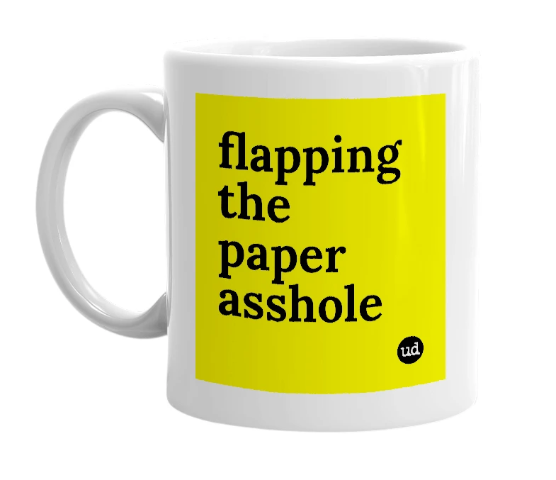 White mug with 'flapping the paper asshole' in bold black letters