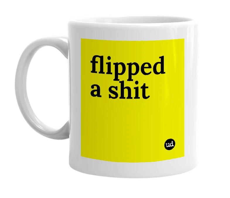 White mug with 'flipped a shit' in bold black letters