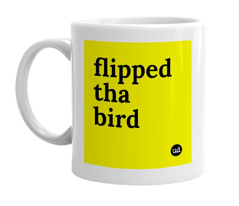 White mug with 'flipped tha bird' in bold black letters