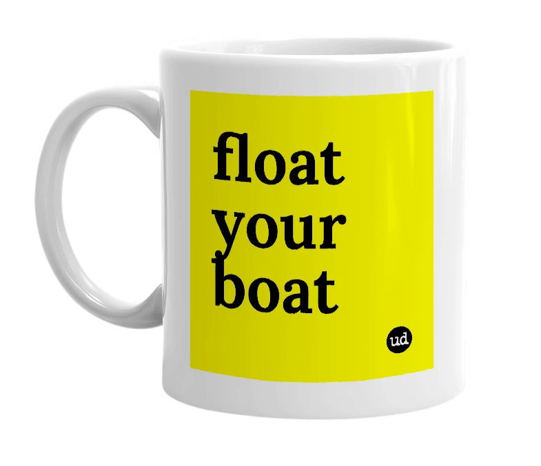 White mug with 'float your boat' in bold black letters