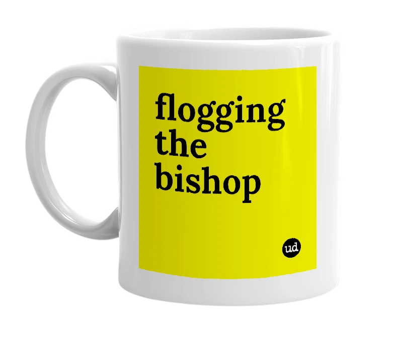 White mug with 'flogging the bishop' in bold black letters