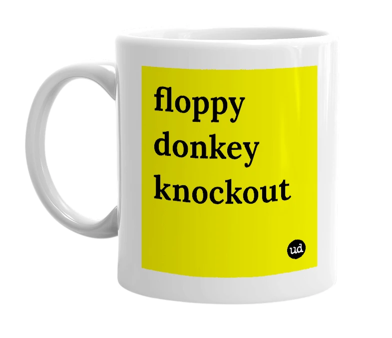 White mug with 'floppy donkey knockout' in bold black letters