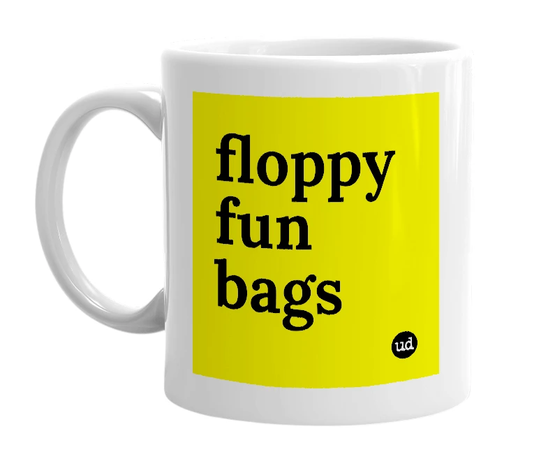 White mug with 'floppy fun bags' in bold black letters