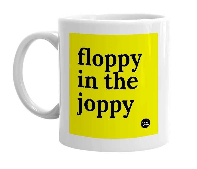 White mug with 'floppy in the joppy' in bold black letters
