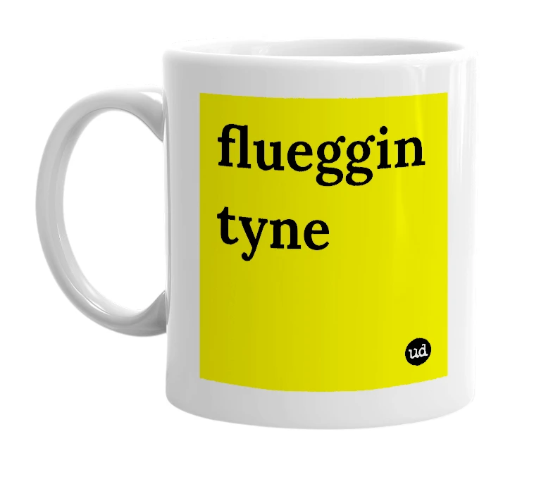 White mug with 'flueggin tyne' in bold black letters