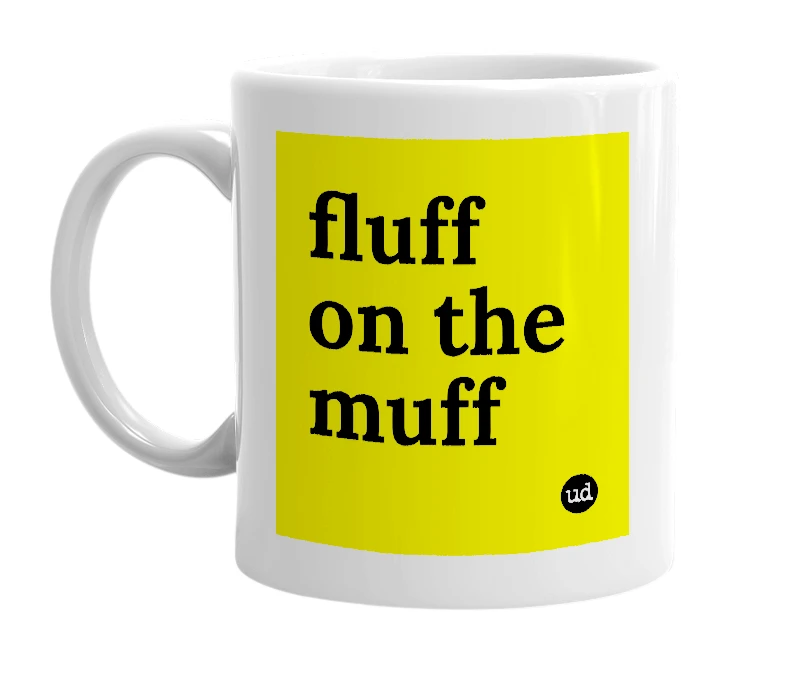 White mug with 'fluff on the muff' in bold black letters