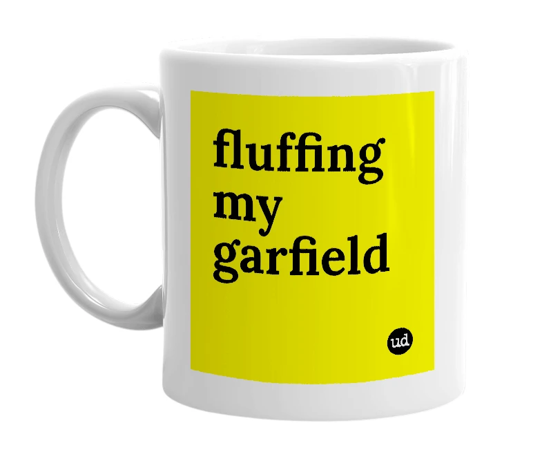 White mug with 'fluffing my garfield' in bold black letters