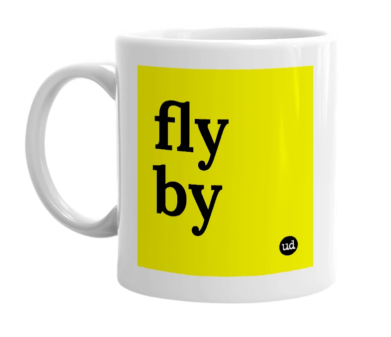 White mug with 'fly by' in bold black letters