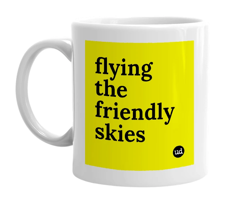 White mug with 'flying the friendly skies' in bold black letters