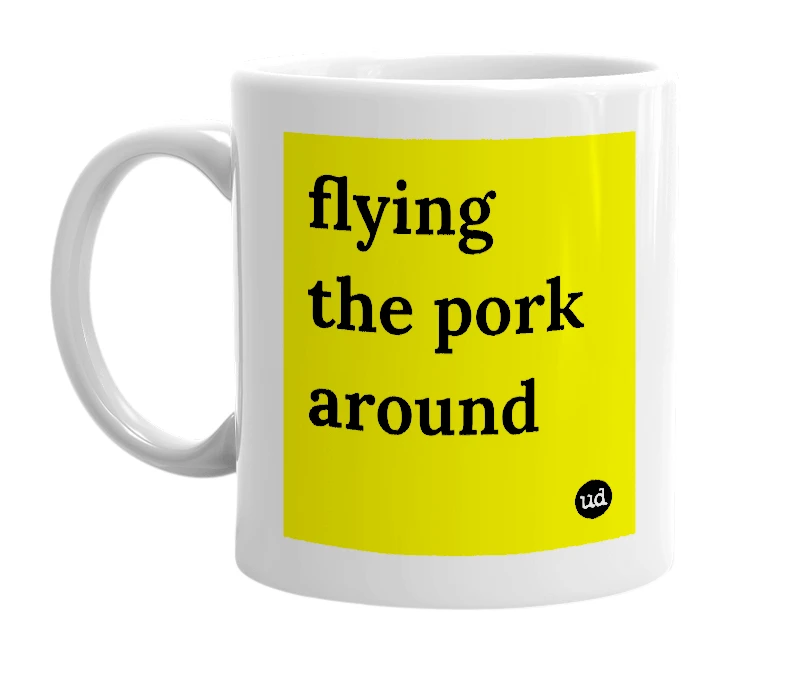 White mug with 'flying the pork around' in bold black letters