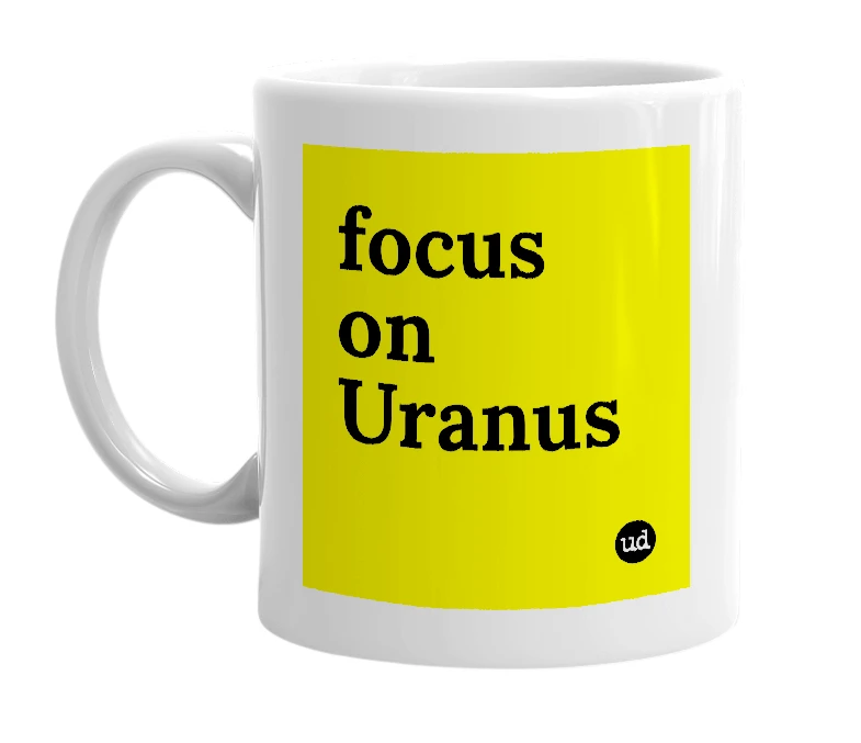 White mug with 'focus on Uranus' in bold black letters