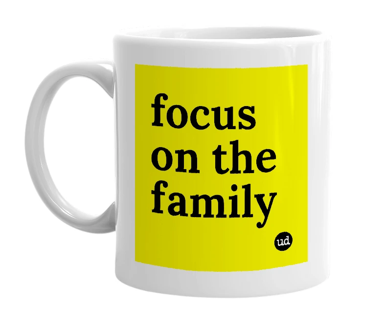 White mug with 'focus on the family' in bold black letters