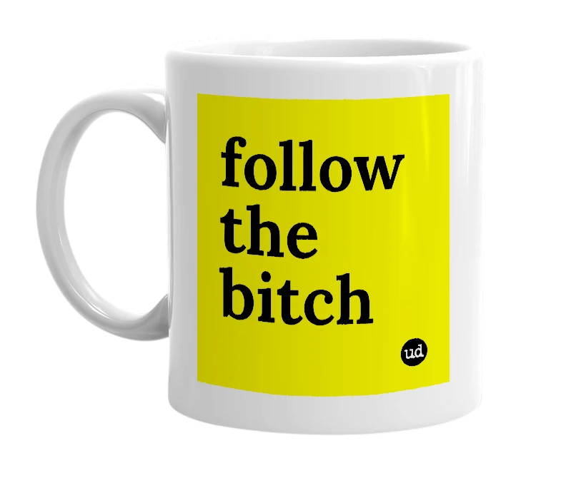 White mug with 'follow the bitch' in bold black letters