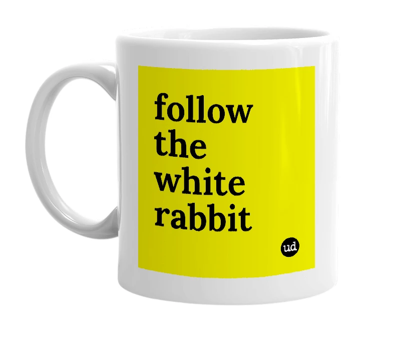 White mug with 'follow the white rabbit' in bold black letters
