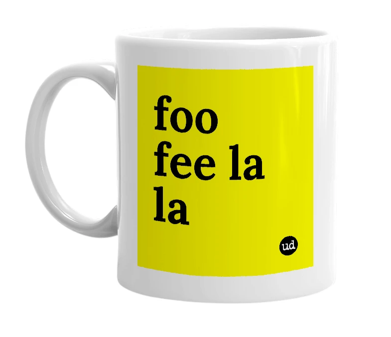 White mug with 'foo fee la la' in bold black letters