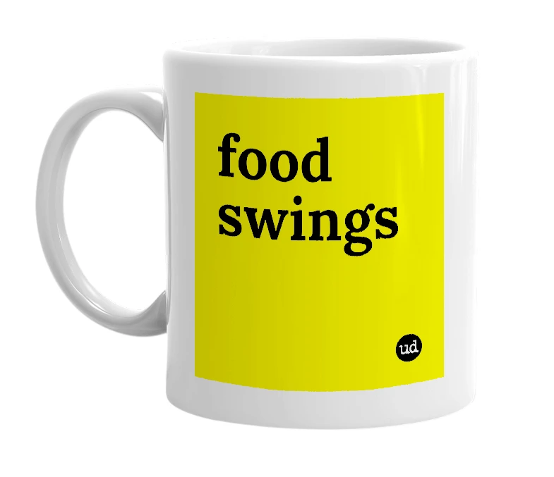 White mug with 'food swings' in bold black letters