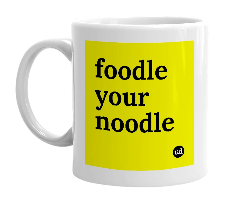 White mug with 'foodle your noodle' in bold black letters