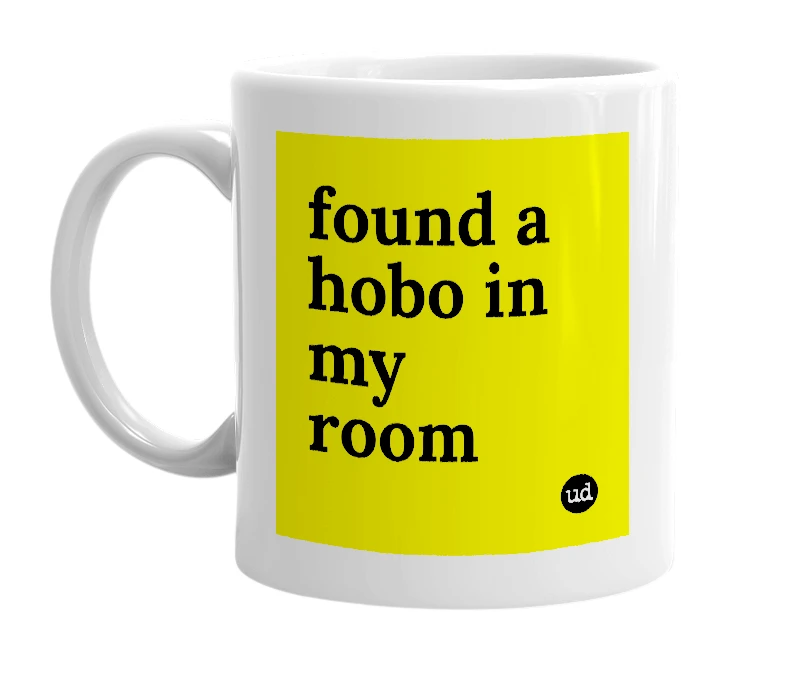 White mug with 'found a hobo in my room' in bold black letters