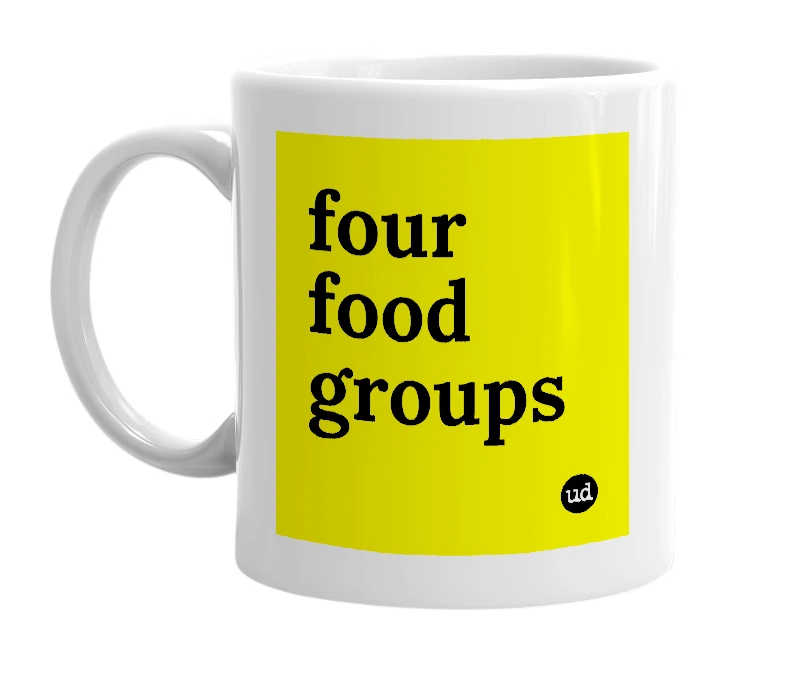 White mug with 'four food groups' in bold black letters