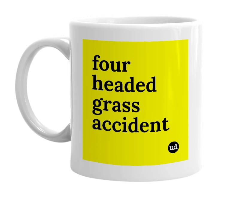 White mug with 'four headed grass accident' in bold black letters