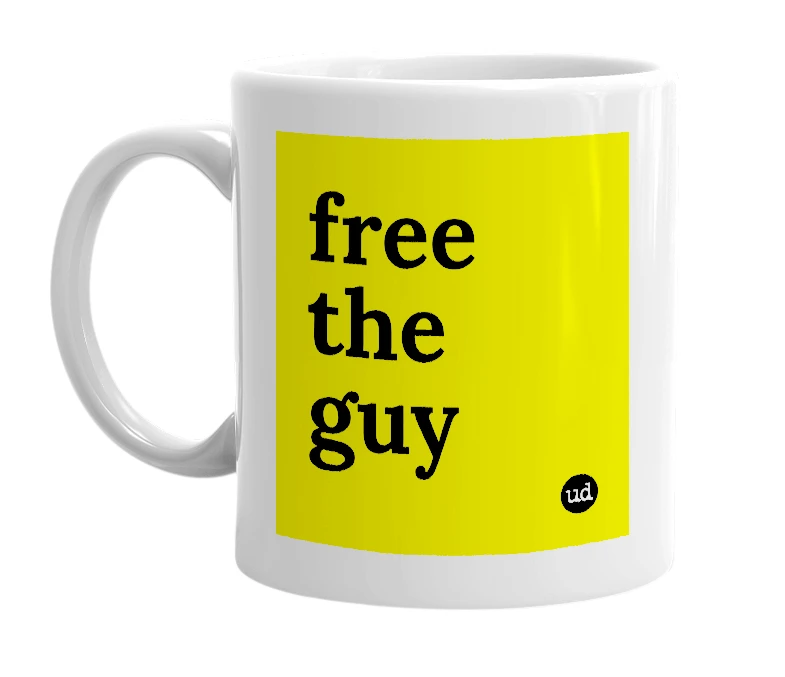 White mug with 'free the guy' in bold black letters