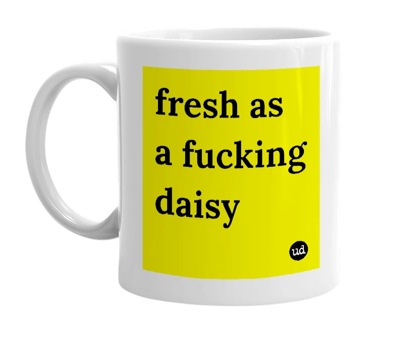 White mug with 'fresh as a fucking daisy' in bold black letters