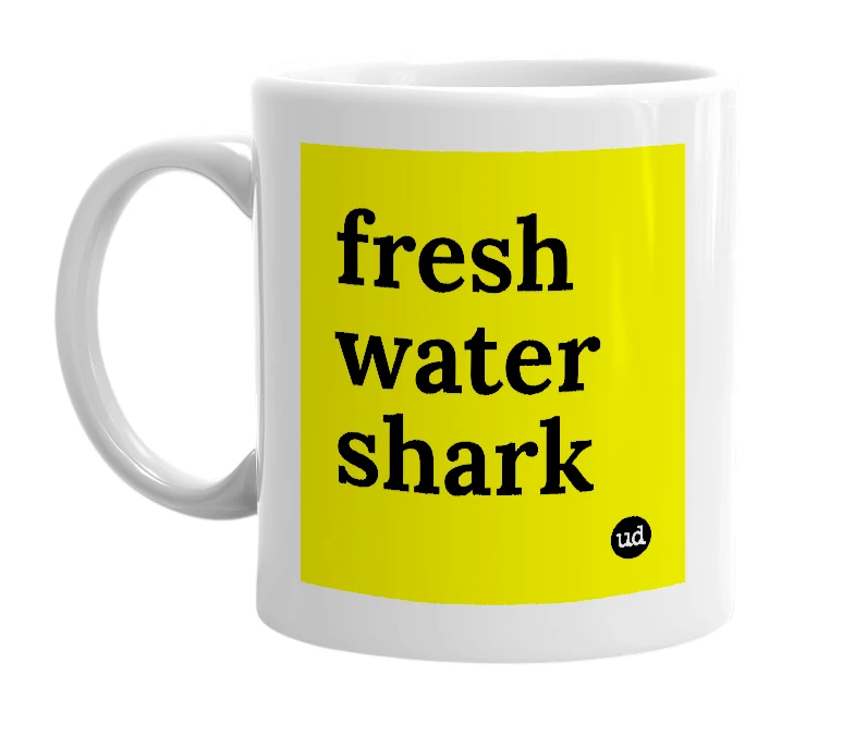 White mug with 'fresh water shark' in bold black letters