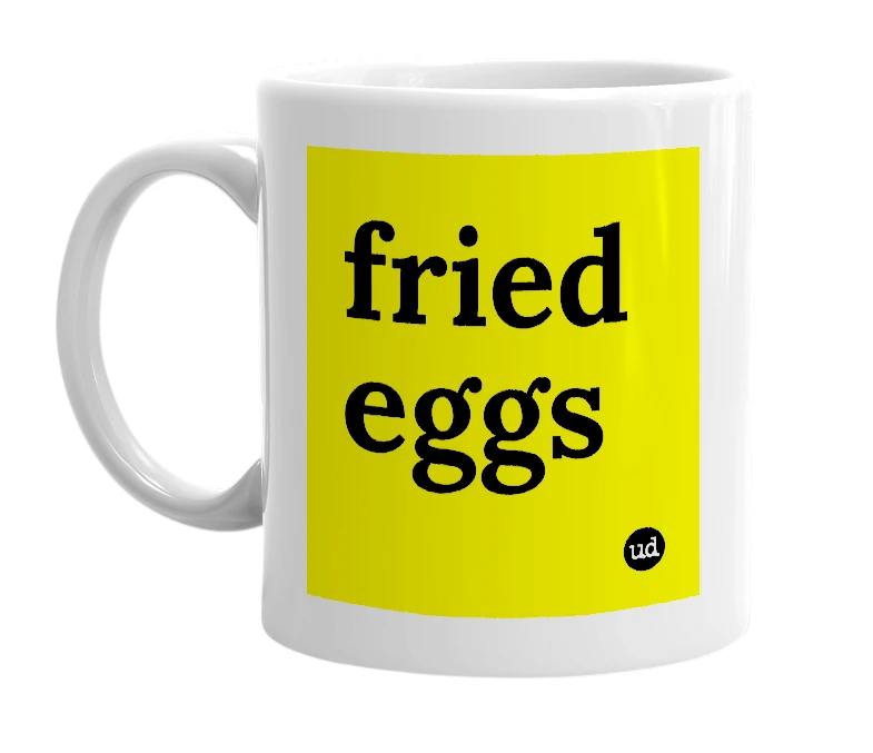 White mug with 'fried eggs' in bold black letters