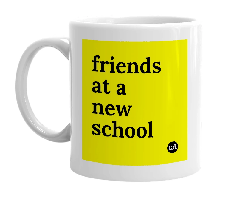 White mug with 'friends at a new school' in bold black letters