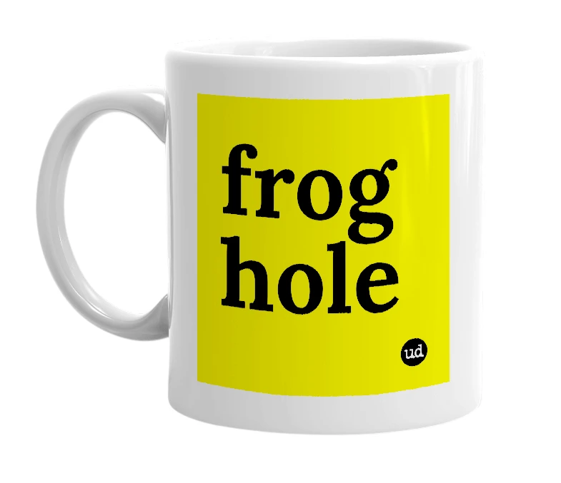 White mug with 'frog hole' in bold black letters