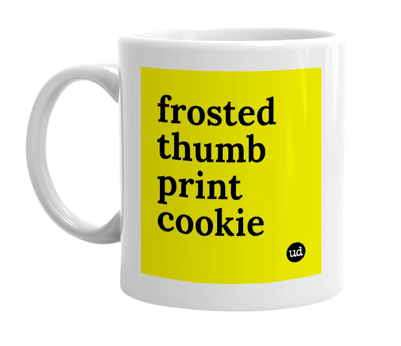 White mug with 'frosted thumb print cookie' in bold black letters