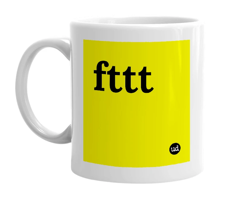 White mug with 'fttt' in bold black letters