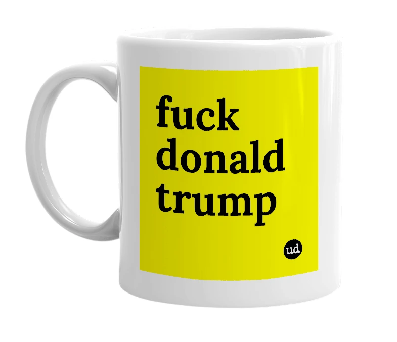 White mug with 'fuck donald trump' in bold black letters