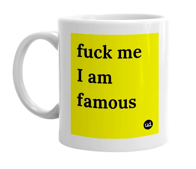 White mug with 'fuck me I am famous' in bold black letters
