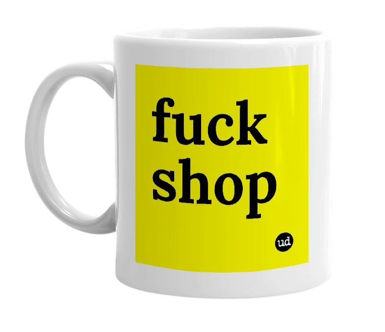 White mug with 'fuck shop' in bold black letters
